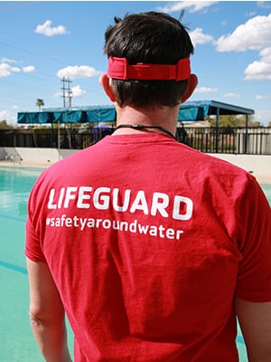 man in lifeguard shirt