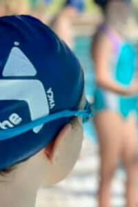 Teen swimmer with goggles on at YMCA swim lessons