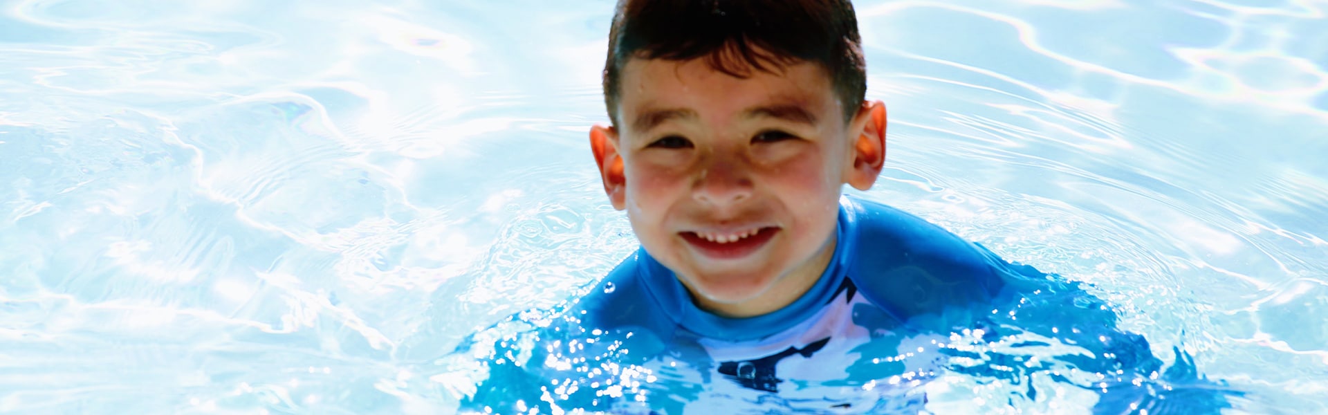 Young Boy Swimming