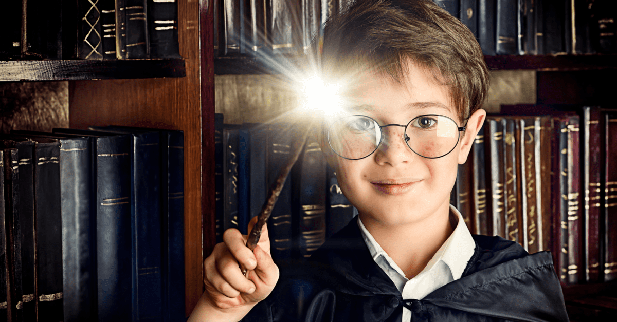 A child holding a wand - Magic and Muggles